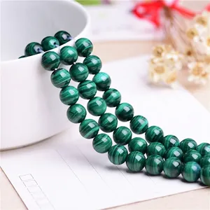Natural malachite round beads for DIY jewelry making with vivid green stripe texture