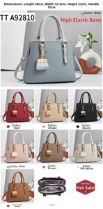 Detail view of woven texture tote bag with multi-compartment interior and mini pouch