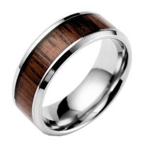 Detailed view of silver stainless steel ring with walnut wood inlay and brushed finish