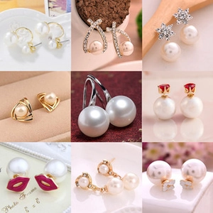 Macro display of assorted pearl and rhinestone stud earrings in multiple elegant designs