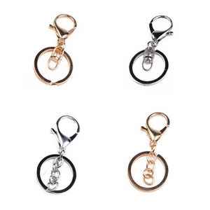 Detailed view of gold and silver alloy lobster clasps for moon and star necklaces