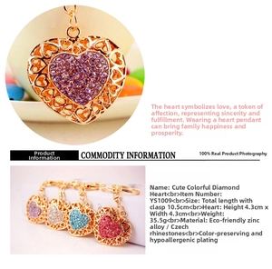 Detailed close-up of heart-shaped keychain featuring colorful Czech rhinestones and zinc alloy