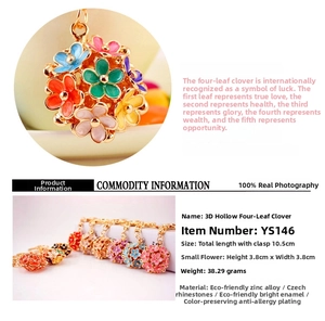 Detail of colorful hollow 3D flower keychain with gold plating and Czech crystals