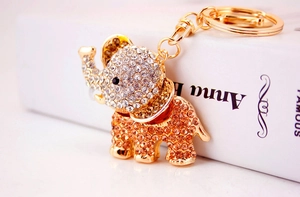 Close-up of elephant keychain with sparkling gold and silver crystal embellishments