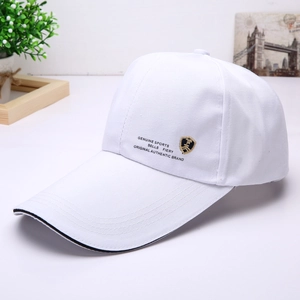 Close-up of white baseball cap with Genuine Sports embroidery and gold shield logo