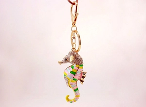 Detailed view of seahorse keychain with colorful enamel and sparkling rhinestones