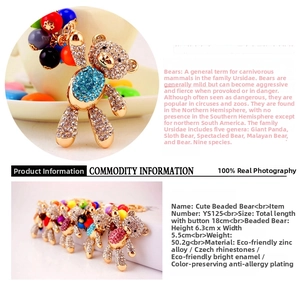 Detail of movable rhinestone bear keychain showing multi-color beads and dimensions
