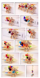 Detail view of rhinestone bear keychains in multiple colors with beaded wristlet straps