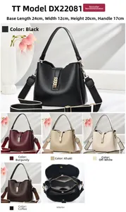 Three-compartment interior view showing the central zipper pocket of a women's leather tote
