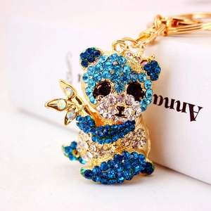 Portachiavi panda con strass blu, corona dorata e ciondolo a forma di bambù colorato