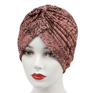 Fashionable leopard print turban hat with a twisted knot design for stylish women