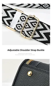 Detail of adjustable golden buckle and black-white geometric woven strap on leather bag