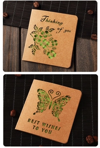 Detail of vintage kraft paper cards with floral cutout designs and Thinking of you text