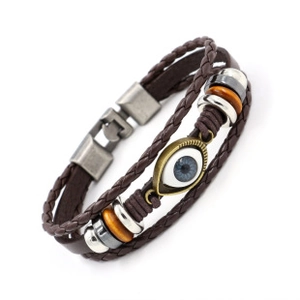 Detail view of multi-layer brown leather bracelet with Evil Eye and vintage beads
