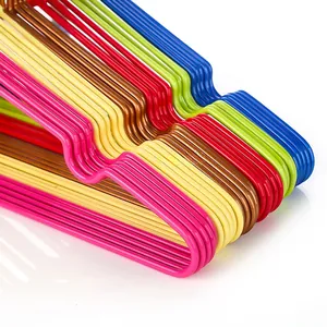 Close-up of colorful non-slip metal hangers showing smooth plastic coating and slim design