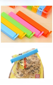 Close-up of colorful plastic food sealing clips for moisture-proof bag storage