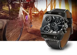 Detail of Oulm men's large black metal watch featuring three time zones and leather strap