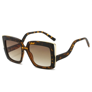 Vintage oversized square sunglasses with tortoiseshell frame and gold metal accents