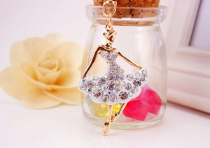 Detailed view of ballet dancer keychain with sparkling rhinestones and gold alloy finish