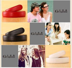 Detailed texture of top grain leather belts in red, black, and white with neat stitching