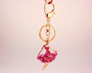 Detail of ballet dancer keychain with pink rhinestones and gold alloy lobster clasp