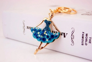 Detail of ballet dancer keychain with blue rhinestones and gold alloy lobster clasp