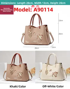 Détail des sacs brodés de fleurs kaki et beige avec dimensions de 28x13x20cm incluses