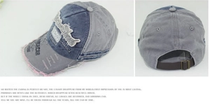Detailed view of distressed baseball cap showing frayed edges and adjustable leather back strap