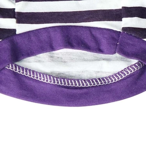 Close-up of purple and white striped pet vest showing detailed ribbing and stitching