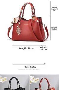 Detailed view of women handbag dimensions and elegant pebble leather texture with accessories