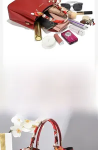 Detail showing red faux leather handbag capacity with scarf handle and daily essentials