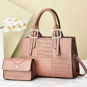 Elegant rose gold 2-piece handbag set with crocodile pattern and adjustable straps