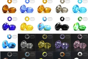Detailed grid of faceted glass spacer beads showing colors and geometric structures