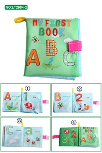 Detailed interior pages of soft baby cloth book showing ABC letters and numbers 123
