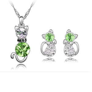 Silver cat jewelry set with green crystals including a necklace and stud earrings