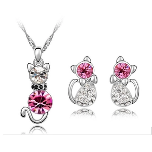 Detail of cat jewelry set with pink and clear crystals on necklace and earrings