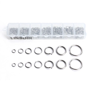 DIY jewelry making kit with various sizes of stainless steel open jump rings in a storage box