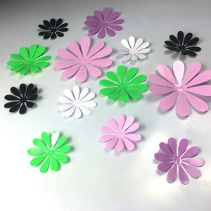 Flat lay of colorful 3D butterfly wall stickers in various sizes for DIY home decor