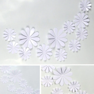 Detailed view of white 3D PVC butterfly wall stickers in various sizes for DIY decor