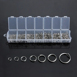 Detail view of 3-10mm silver stainless steel jump rings in 7-compartment storage box