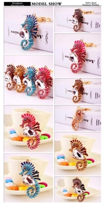 Detailed view of colorful seahorse keychains with sparkling rhinestones and crystal charms