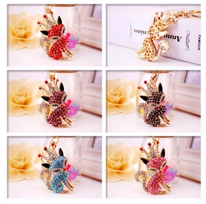 Detailed grid of crystal fox keychains in six vibrant colors with crown details