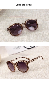 Detail of leopard print round kids sunglasses with UV400 protection and gradient lenses