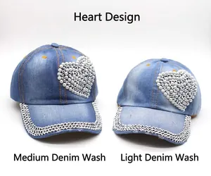 Women's denim baseball caps with rhinestone heart and pearl embellishments in blue
