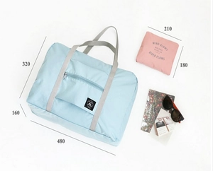 Detailed dimensions of the foldable waterproof travel bag in blue and pink versions