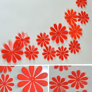 Detail of red 3D butterfly wall stickers with glossy finish for creative DIY home decor