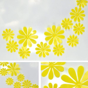 Detailed view of 12pcs 3D yellow daisy wall stickers in various sizes for DIY home decor