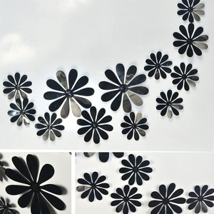 Detailed view of black metallic 3D butterfly wall stickers in various sizes for DIY decor