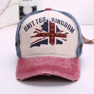 Close-up of vintage washed baseball cap with United Kingdom embroidery and metal stars