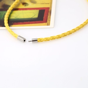 Close-up of yellow braided PU leather cord with a secure silver metal plug-in buckle